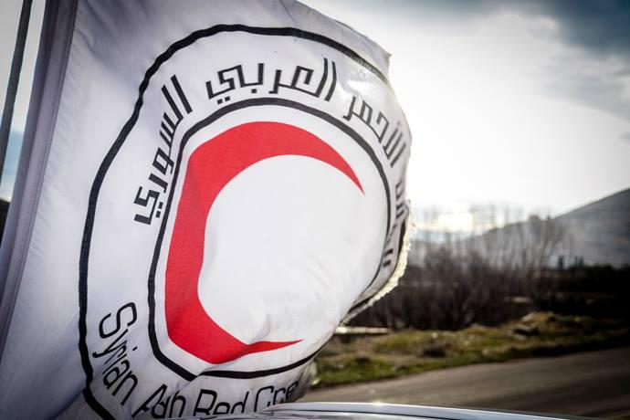الشبكة السورية تتهم الهلال الأحمر بسرقة المساعدات في مناطق سيطرة النظام